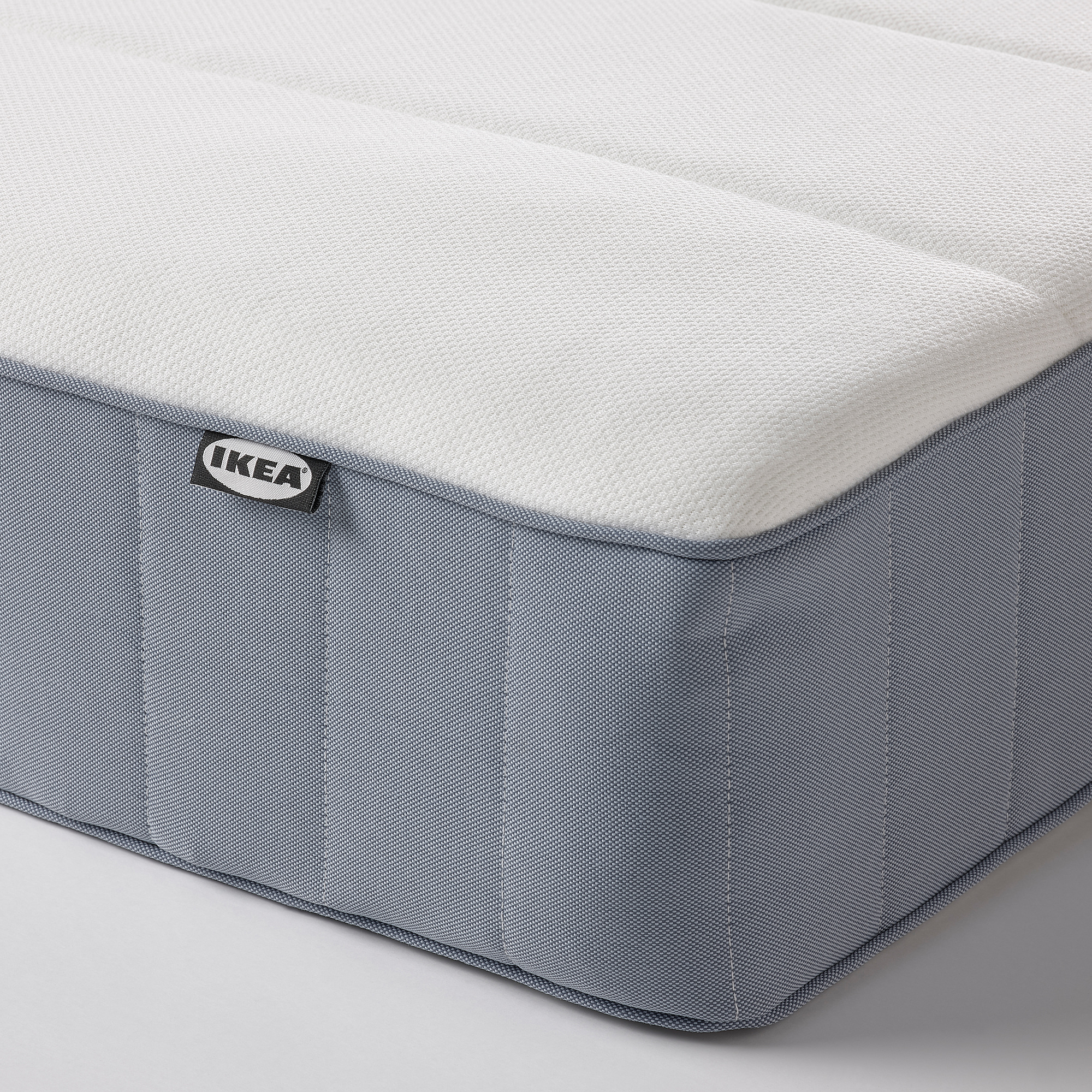 TÄLLÅSEN upholstered bed frame with mattress