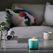 DVÄRGHÖK scented candle in glass with lid