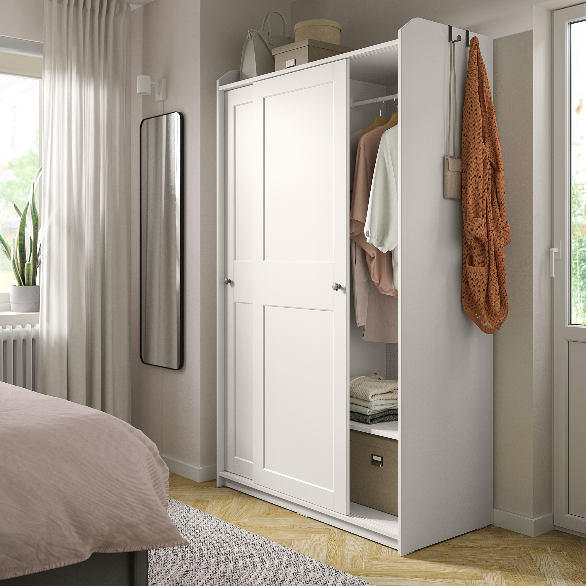 HAUGA wardrobe with sliding doors