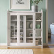 HAUGA glass-door cabinet