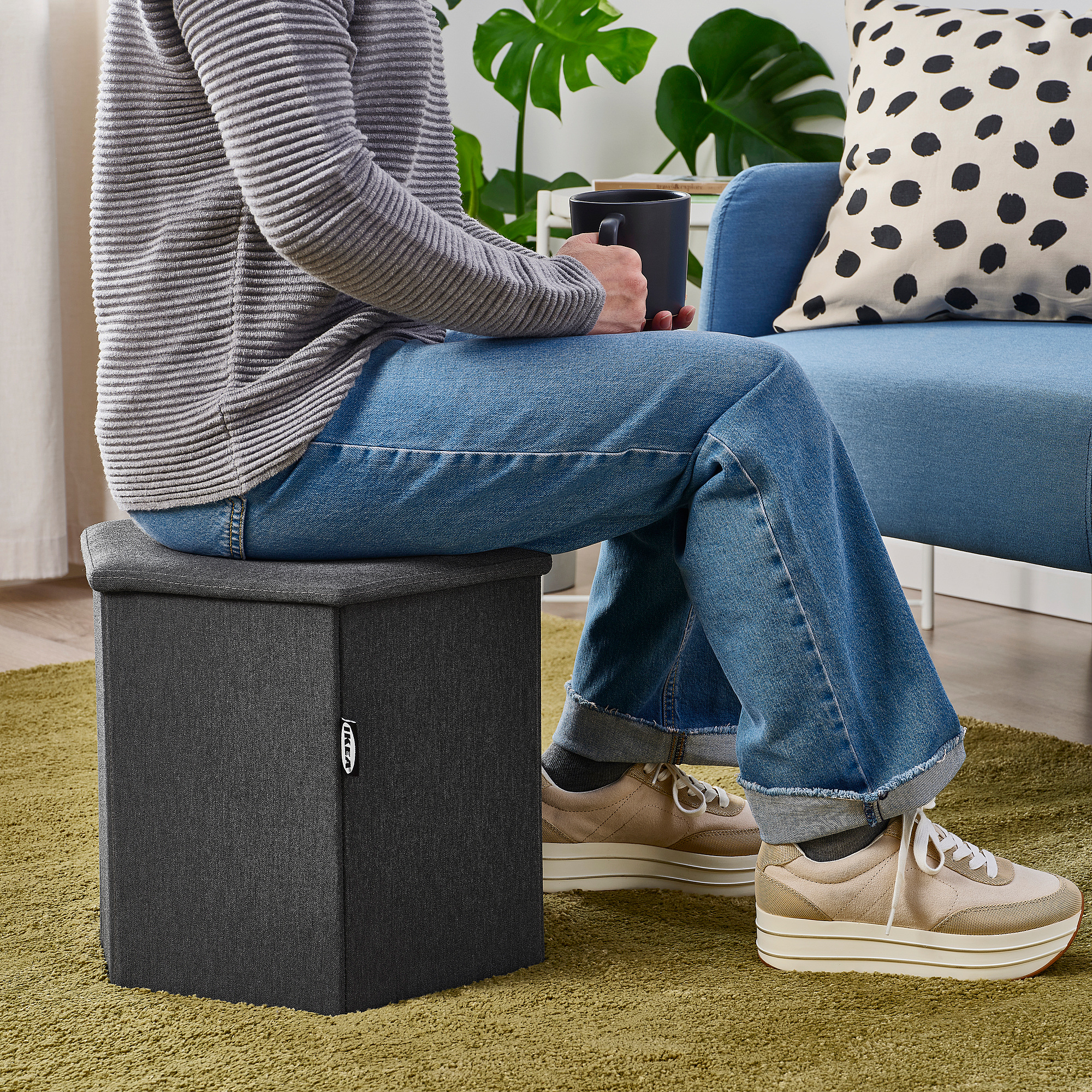 KJUGE pouffe with storage