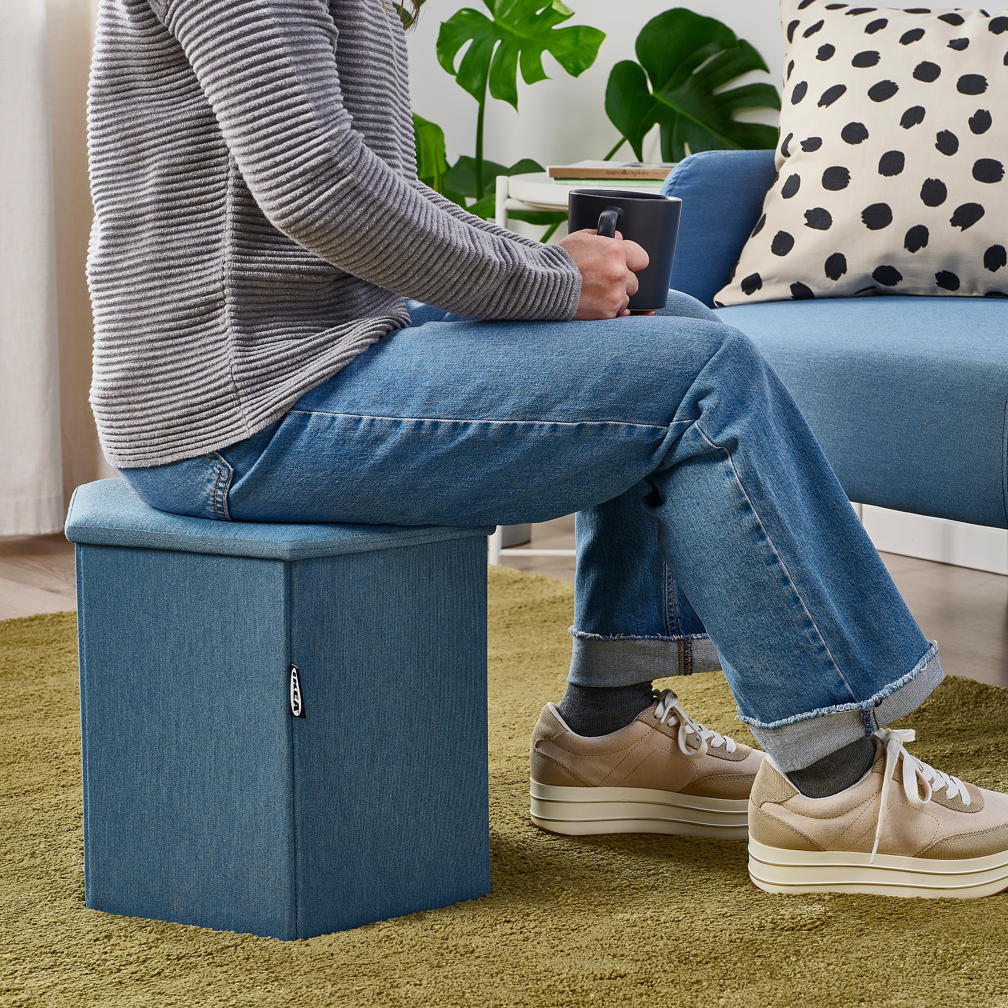 KJUGE pouffe with storage