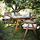 FALHOLMEN - table+4 chairs w armrests, outdoor, light brown stained/Kuddarna grey | IKEA Taiwan Online - PE809695_S1