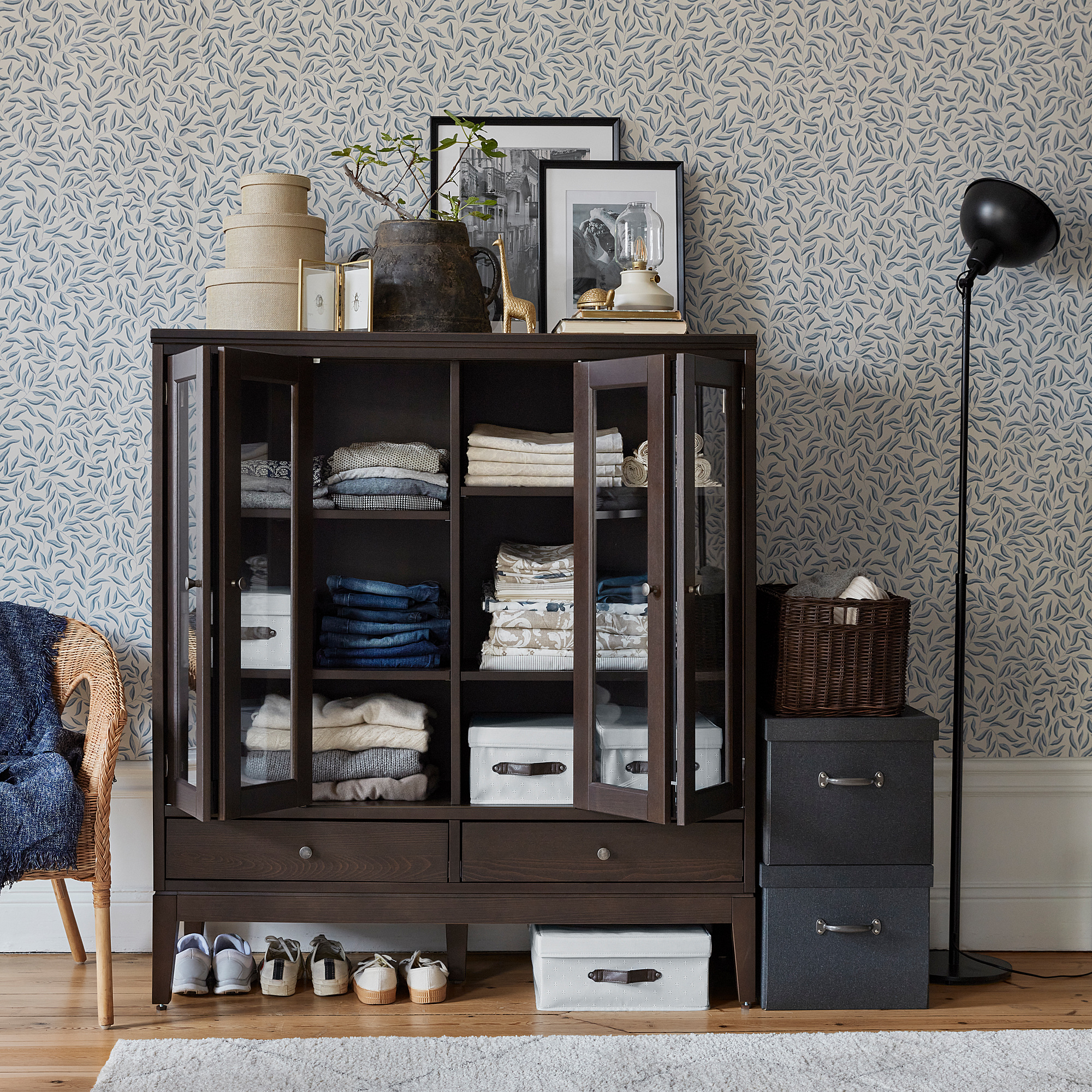 IDANÄS cabinet with bi-folded glass doors