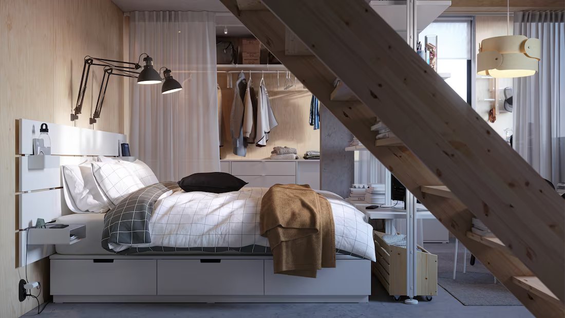 A small bedroom in a rented studio with a minimal aesthetic