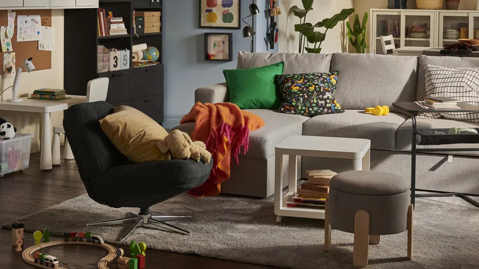 A kid-friendly living room with a sleeping surprise